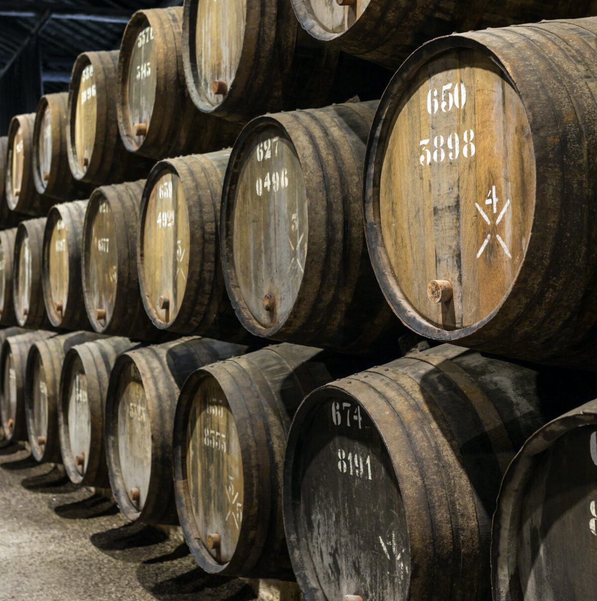Oak casks in a whisky warehouse