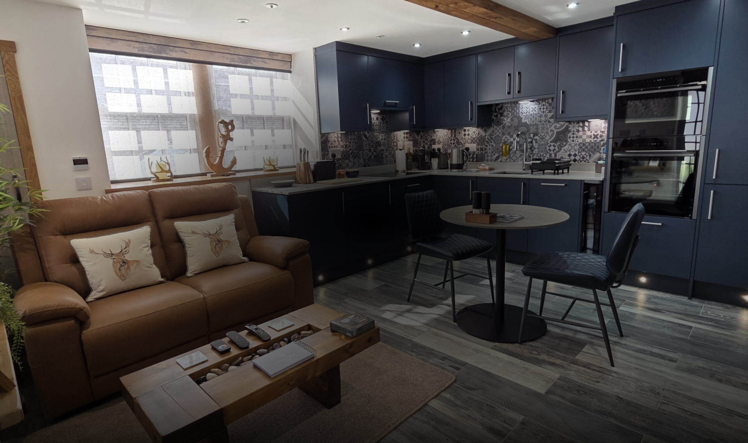 Open-plan living room and kitchen at The Wee Fiddle